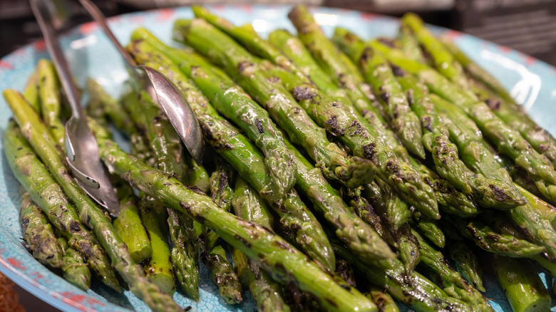 Pile of cooked asparagus on a plate