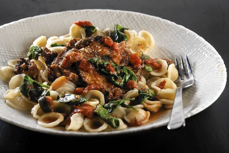Slow-roasted beef pot roast with fennel sausage and spinach