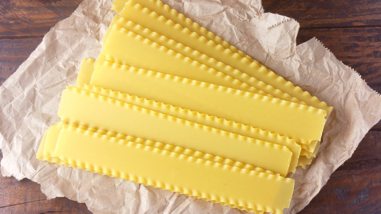Sheets of lasagna noodles on paper