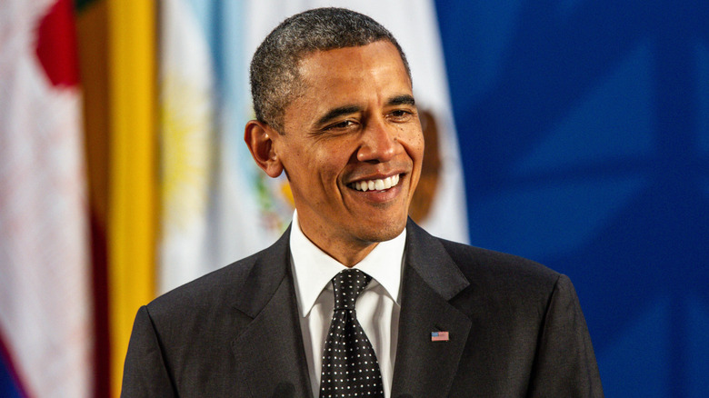 Former President Barack Obama smiling