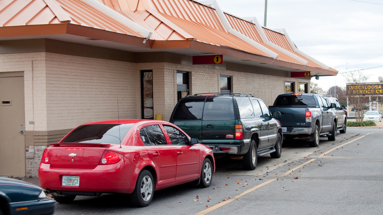 Cars queuing at a drive-through